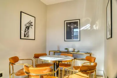 a dining room with a table and chairs at REF 1392 - Cannes palais des festivals apartment for rent in Cannes