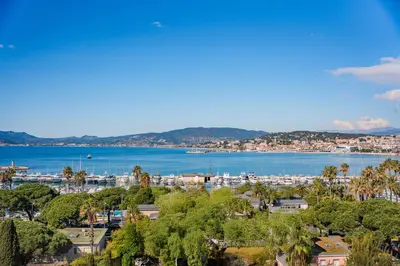 a view of a city and a body of water at Appartement vue mer panoramique in Cannes