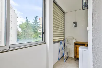 a bathroom with a window and a sink at T3 proche de la Croisette et Palais des Festivals in Cannes