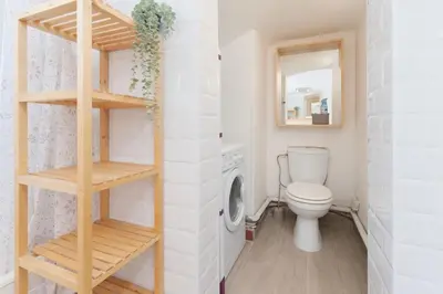 a bathroom with a toilet and a washing machine at Le Tassigny #Central #Quiet #Air conditioning #Wifi in Cannes