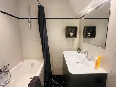 a bathroom with a sink and a bath tub at One bedroom apartment with a sea view right by the Croisette beaches and the center of Cannes. - 2287 in Cannes