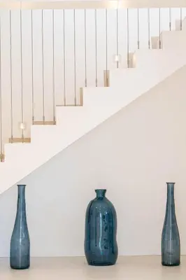 three blue vases sitting in front of a staircase at Luxury Villa Cannes,350 m2, 12 pers, 6 ch 6 sdb in Cannes