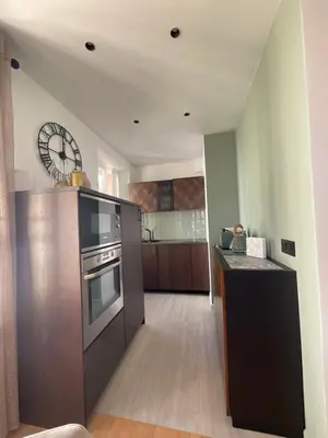a kitchen with a sink and a stove top oven at Newly renovated 3-rooms apartment in the heart of old Cannes, up to 6 persons in Cannes