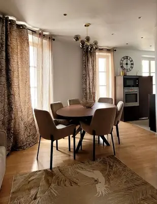 a dining room with a table and chairs at Newly renovated 3-rooms apartment in the heart of old Cannes, up to 6 persons in Cannes