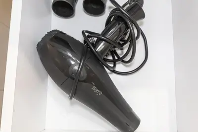a black router sitting on a white table at Le Vendôme - Hypercentre - AC - Terrace - Palais of Festivals - Croisette in Cannes