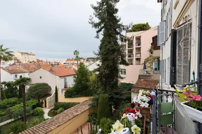 a view of a city from a balcony at Charmant appartement à 5min du Palais des Festivals in Cannes