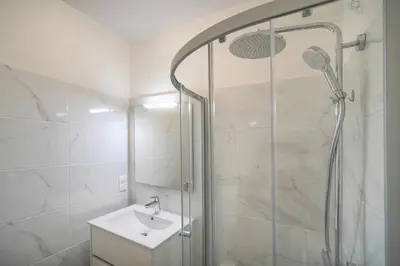 a bathroom with a shower and a sink at Lumineux studio LOGGIA, Alexandre III- proche CROISETTE A0B203 in Cannes