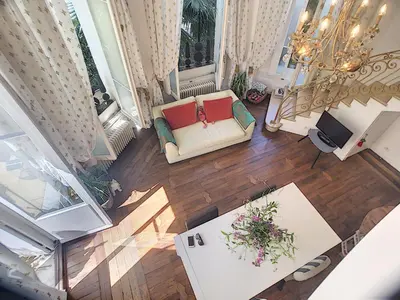 an overhead view of a living room with a couch at Charmant appartement en duplex 288L in Cannes
