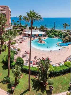 an aerial view of a swimming pool at a resort at Beautiful apartment with sea view in Cannes 5 pers in Cannes