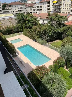 an overhead view of a swimming pool in a yard at Studio centre Cannes, piscine, climatisation in Cannes