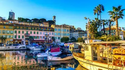 a group of boats docked in a harbor with buildings at Cannes Centre-Ville, Clim, WiFi 2-4P in Cannes
