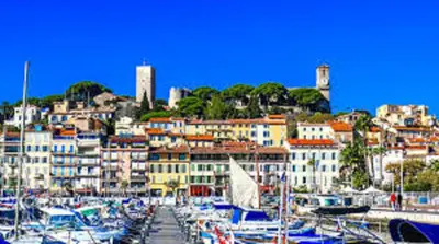 a bunch of boats parked in a harbor with buildings at Cannes Centre-Ville, Clim, WiFi 2-4P in Cannes