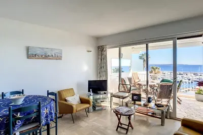 a living room with a view of the ocean at Henri Camille Agency - Le Cap - 2 bedrooms Apt sea view in Cannes