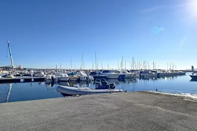 a bunch of boats docked in a marina at Henri Camille Agency - Le Cap - 2 bedrooms Apt sea view in Cannes