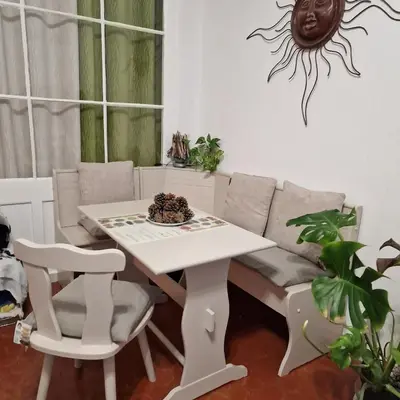 a table and chairs in a living room with a couch at Cannes - Centre- Film Festival in Cannes