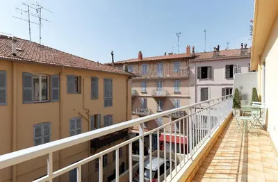 a balcony with a view of some buildings at Work or vacation - lovely apartment - central in Cannes