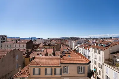 an aerial view of a city with buildings at REF 1996 Cannes Croisette - Sea view apartment for rent in Cannes