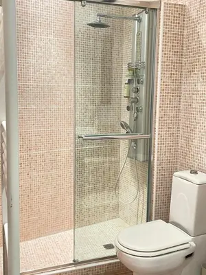 a shower stall with a toilet in a bathroom at CANNES SUQUET spacieux studio in Cannes