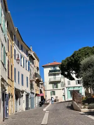 an empty street in a city with buildings at CANNES SUQUET beautiful Duplex in Cannes