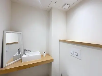 a bathroom with a sink and a mirror at Cozy 2-bedroom apartment with terrace, sea view and parking in Cannes in Cannes