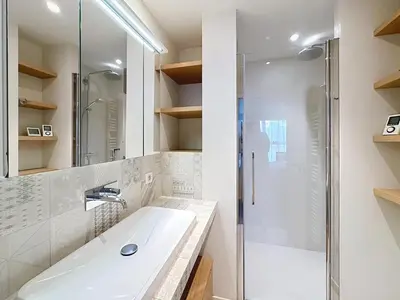 a bathroom with a sink and a shower at Cozy 2-bedroom apartment with terrace, sea view and parking in Cannes in Cannes
