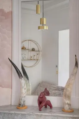 a bedroom with a bed and two vases on a table at Sublime appartement luxe T3 incroyable Jardin Plein cœur Cannes in Cannes