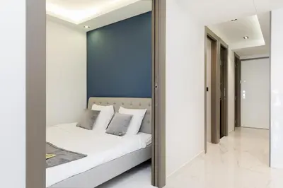 a mirror reflection of a bed in a bedroom at Gray d'Albion 3i7 YourHostHelper in Cannes