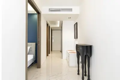 a hallway with a black table in a room at Gray d'Albion 3i7 YourHostHelper in Cannes