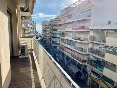 an apartment balcony with a view of a parking lot at Cannes - Latour-Maubourg - 2 P rénové tout confort in Cannes