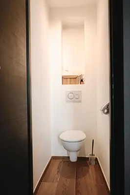 a bathroom with a white toilet in a room at 2 Pieces bourgeois centre de Cannes 4 couchages une pépite in Cannes