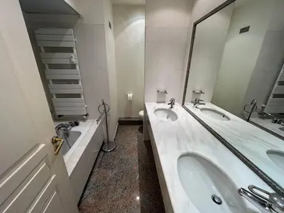 a bathroom with two sinks and a large mirror at 540 Cannes La Croisette - Joli studio au calme coté jardin in Cannes