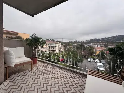 a balcony with a view of a city at Mont Joli in Le Cannet