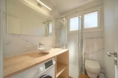 a bathroom with a sink and a toilet and a shower at Elégant studio TERRASSE- proche PLAGES et CROISETTE A0B206 in Cannes