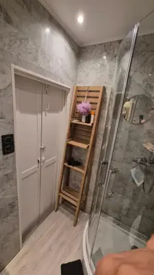 a bathroom with a walk in shower at Centre Carré d'or 3 chambres in Cannes