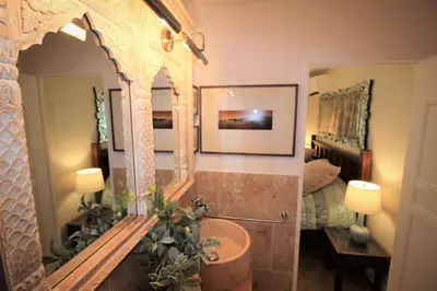 a bathroom with a sink and a mirror at La Californie Views II in Cannes