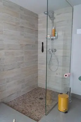 a bathroom with a shower with a glass door at Apartment in Cannes in Cannes