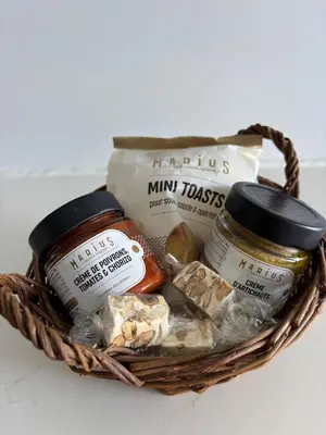 a basket filled with different types of food at Cannes Blue Riviera Luxe in Cannes