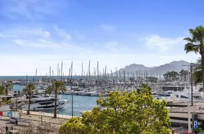a marina with lots of boats in the water at LES SUITES DU PALAIS sur LA CROISETTE - Vue MER in Cannes