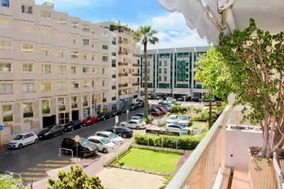 a view from a balcony of a parking lot with cars at REF 2003 - Cannes Croisette - 3 mins from the Croissette in Cannes