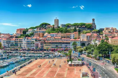 a view of a city with a harbor and buildings at Peaceful villa with pool and garden - 5 minutes from Cannes beaches in Cannes