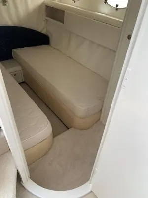 a small bed in the corner of a small room at yacht 17M Princess V52 Cannes port canto 3 chambres AC in Cannes