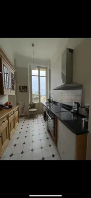 a kitchen with a stove and a counter top at Parc Continental Apartment with sea view in Cannes