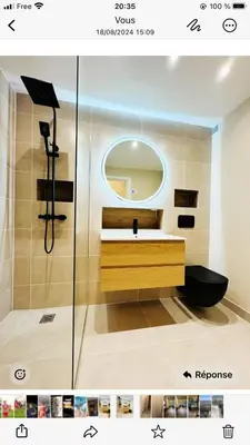 a bathroom with a sink and a mirror at Studio terrasse Croisette in Cannes