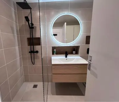 a bathroom with a sink and a mirror at Studio terrasse Croisette in Cannes