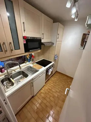 a small kitchen with a sink and a microwave at CANNES Vue Mer & Balcon dans Villa Exceptionnelle Belle Époque la Californie in Cannes