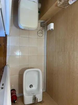 a bathroom with a white urinal and a sink at CANNES Vue Mer & Balcon dans Villa Exceptionnelle Belle Époque la Californie in Cannes