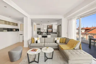 a living room with a couch and a table at REF 1493 - Cannes -City Center Banane District in Cannes