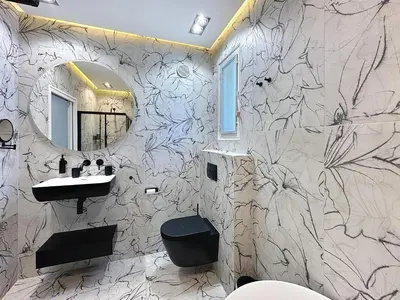 a bathroom with a black and white marble wall at Modern 5-bedroom villa with swimming pool in Cannes in Cannes