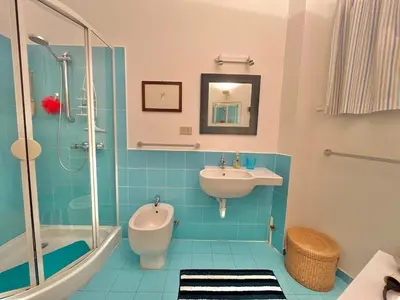 a bathroom with a sink and a shower at Two rooms near Martinez in Cannes
