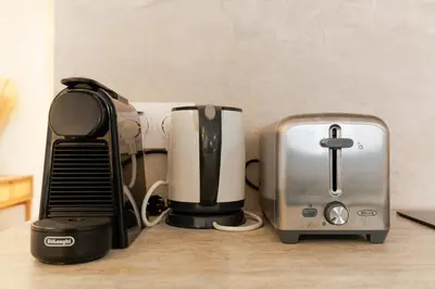 a kitchen counter with two toasters and a toaster at El Sole - Plage - Wifi - Croisette in Cannes